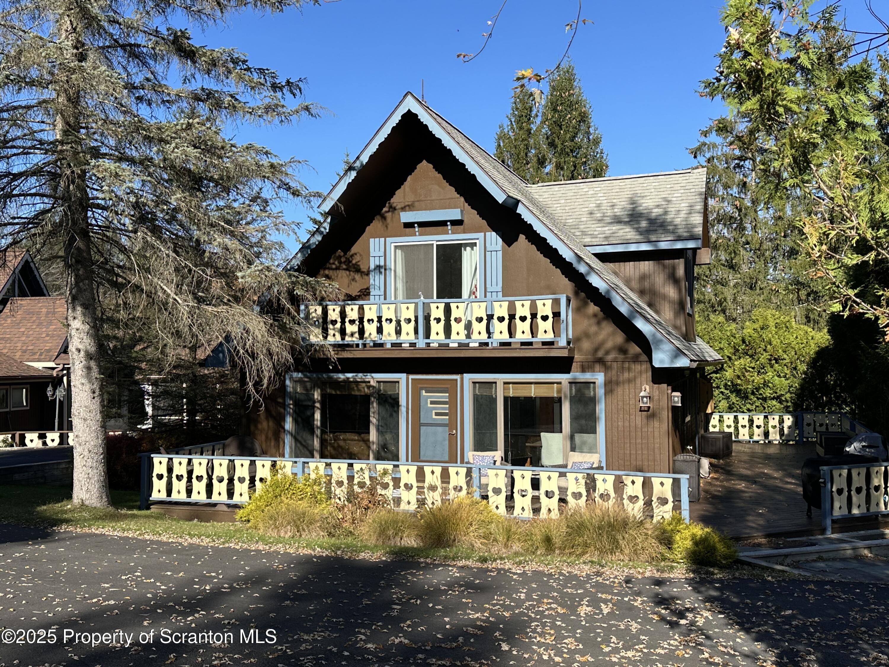 25 Fall Place Union Dale, PA 18470 - Photo 2 of 27 a front view of a house with a yard