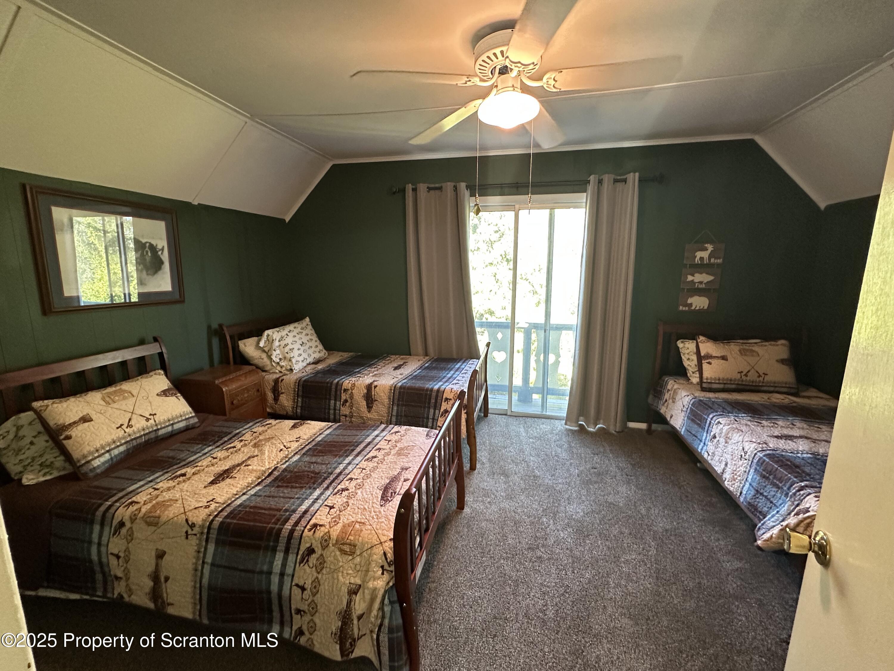 25 Fall Place Union Dale, PA 18470 - Photo 23 of 27 a bedroom with double bed and a window