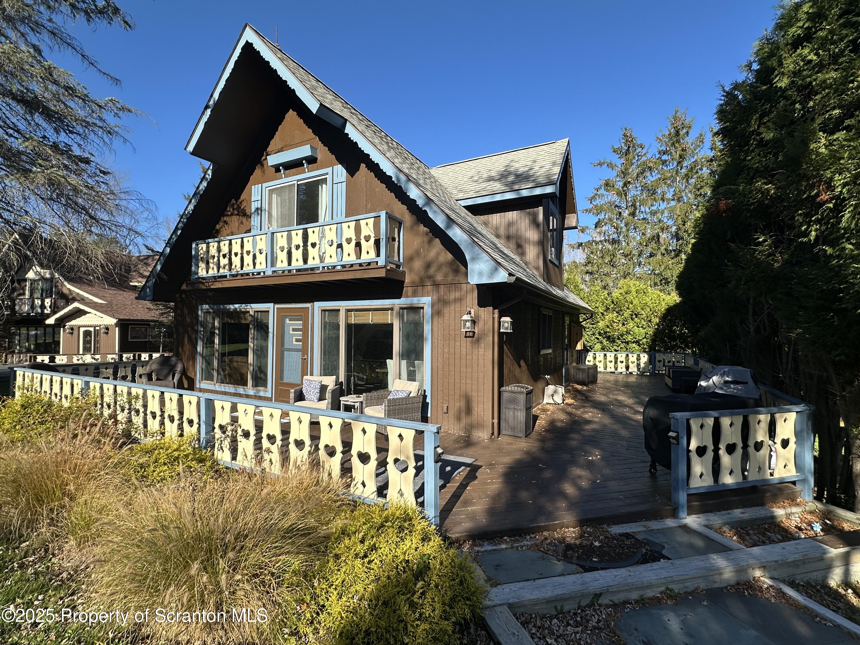 25 Fall Place Union Dale, PA 18470 - Photo 4 of 27 a front view of a house with a yard