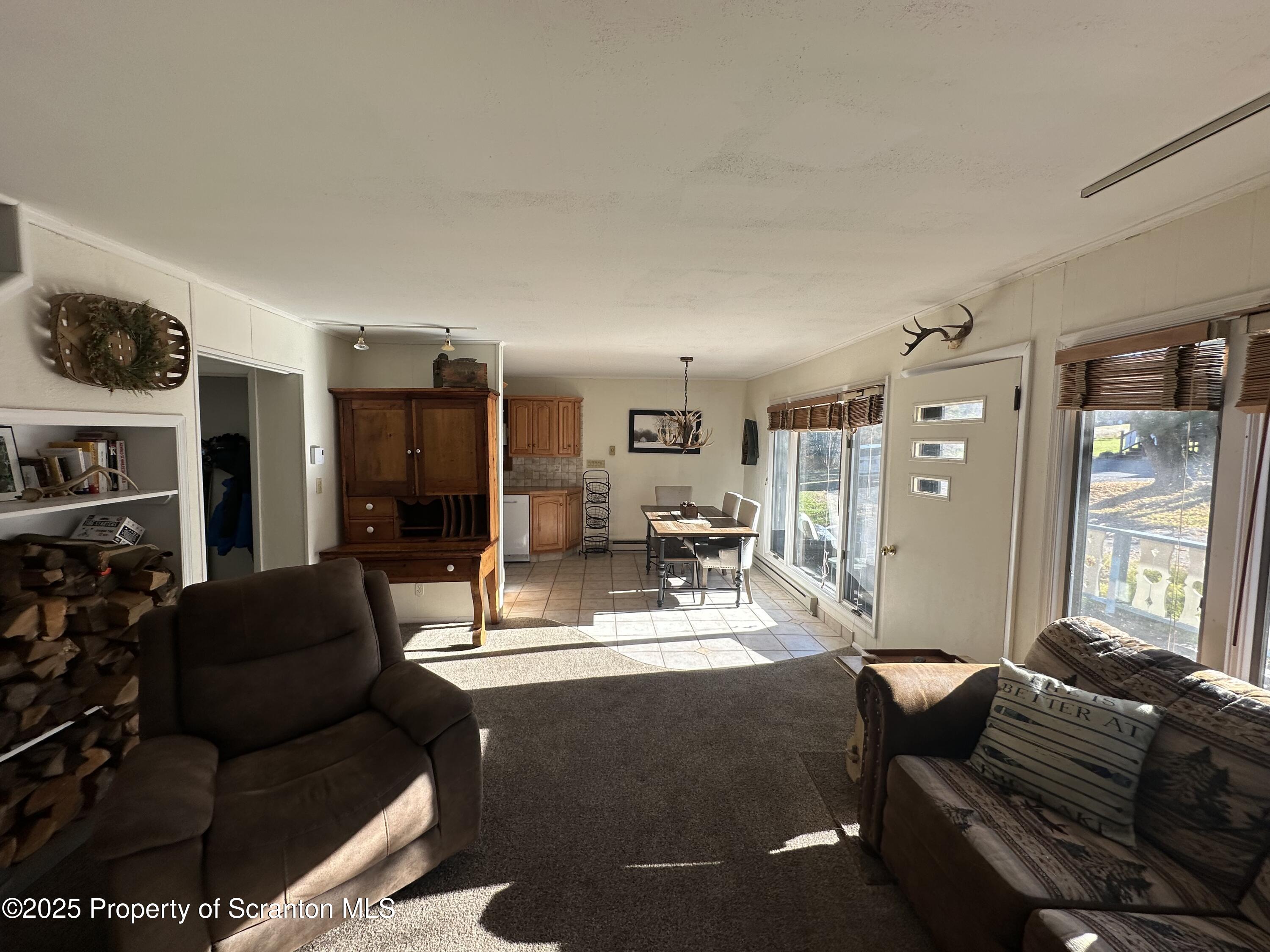 25 Fall Place Union Dale, PA 18470 - Photo 8 of 27 a living room with furniture rug and window