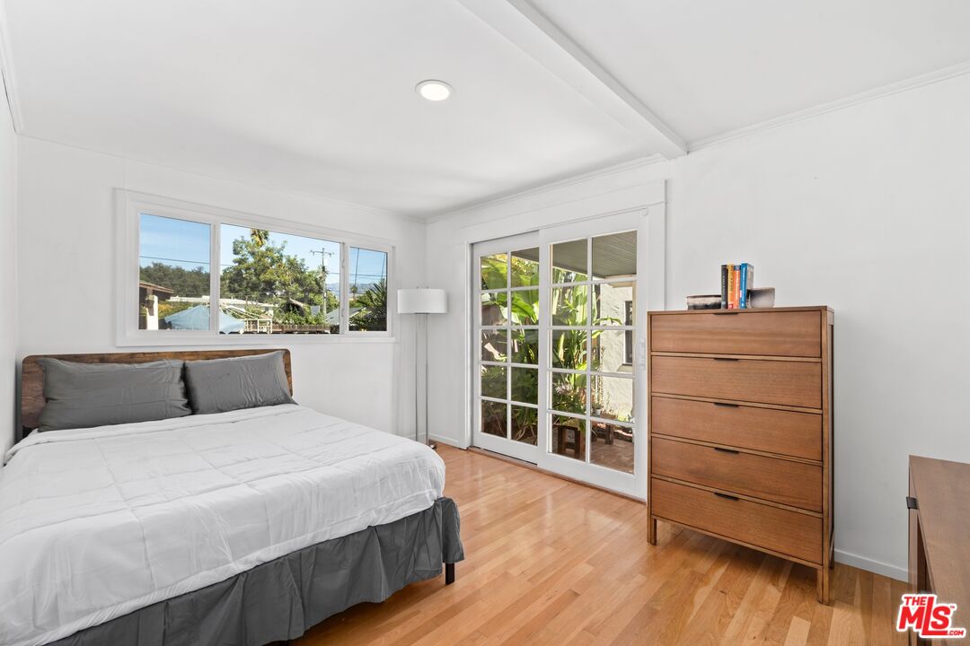 910 North Bushnell Avenue Alhambra, CA 91801 - Photo 11 of 23 a bedroom with a bed and a dresser