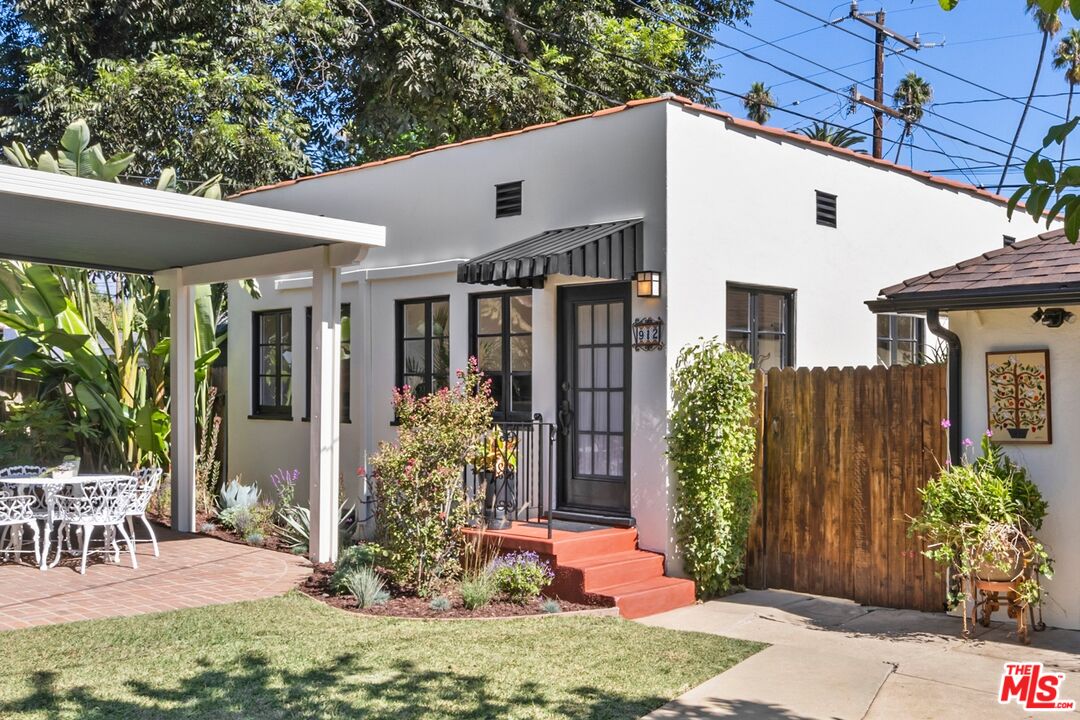 910 North Bushnell Avenue Alhambra, CA 91801 - Photo 12 of 23 a view of a house with backyard and sitting area