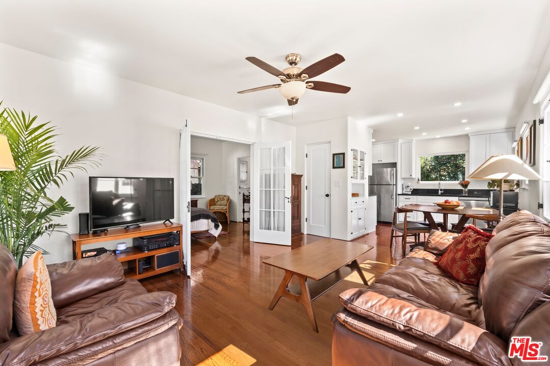910 North Bushnell Avenue Alhambra, CA 91801 - Photo 13 of 23 a living room with furniture and a flat screen tv