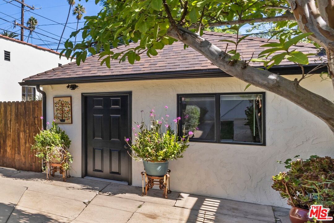 910 North Bushnell Avenue Alhambra, CA 91801 - Photo 19 of 23 a front view of a house with garden