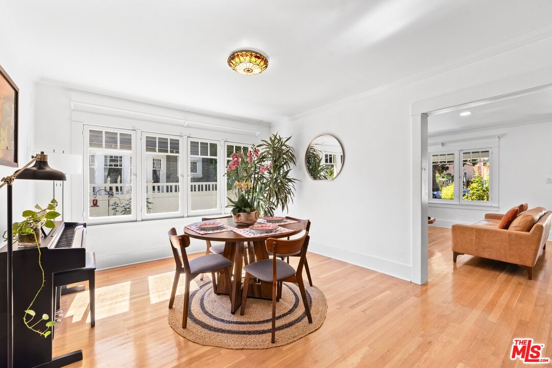 910 North Bushnell Avenue Alhambra, CA 91801 - Photo 5 of 23 a view of a dining room with furniture and wooden floor