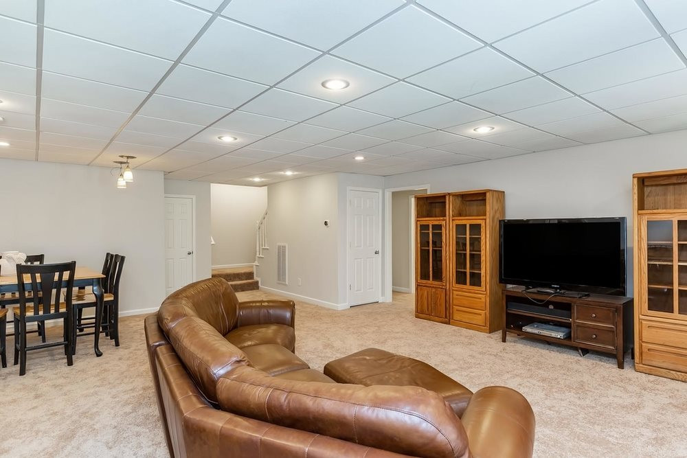 4401 Irene Way Raleigh, NC 27603 - Photo 19 of 30 Finished Basement has 2 additional rooms for Fitness/Crafting/Sewing/PlayRoom, full bath w/tub/shower, Den, Office/Study, unfinished section for storage, and Bonus Room! Bonus Room