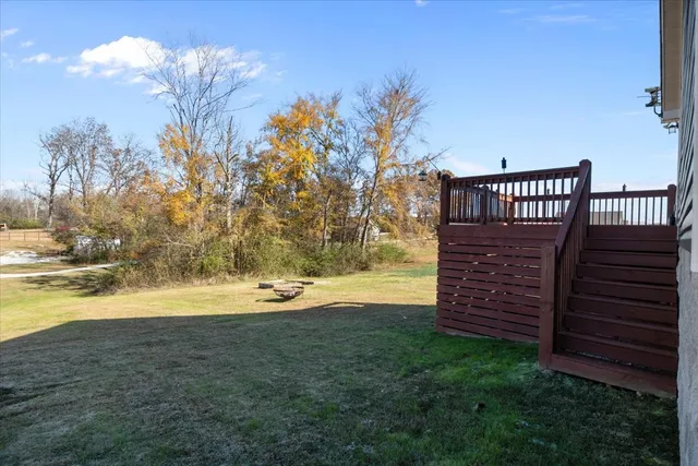 a view of a swimming pool with an outdoor space and seating area