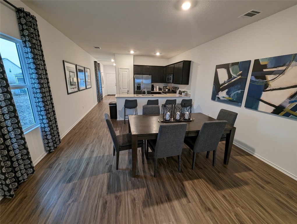 361 Soapstone Pass Maxwell, TX 78656 - Photo 1 of 17 Model example of dining and family room area