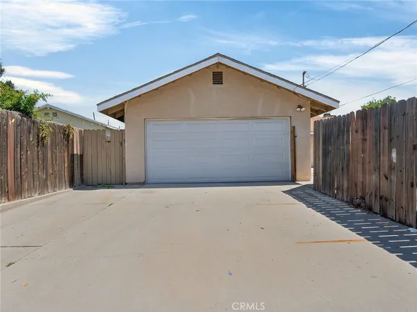 a front view of a house with a garage