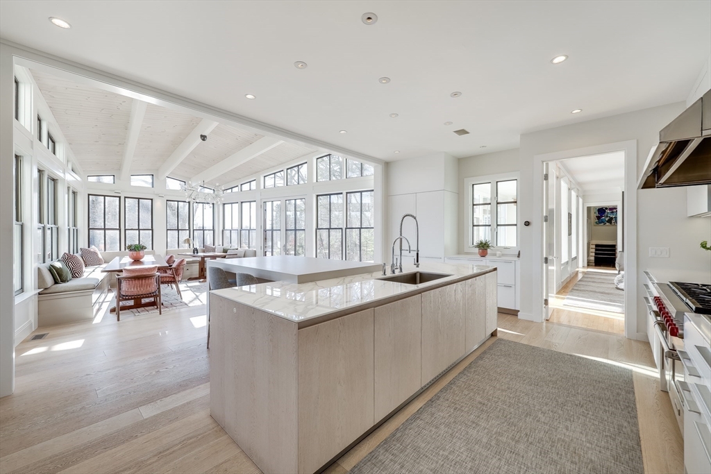 75 Buttricks Hill Drive Concord, MA 01742 - Photo 4 of 24 a large white kitchen with a large window and refrigerator