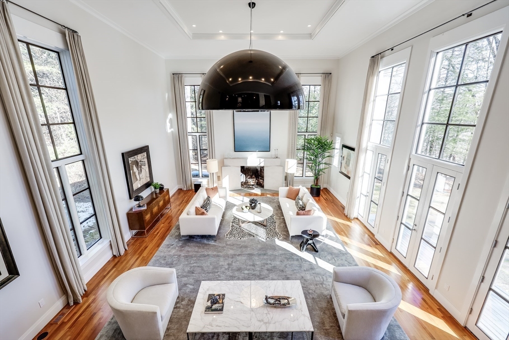 75 Buttricks Hill Drive Concord, MA 01742 - Photo 5 of 24 a living room with furniture and a large window