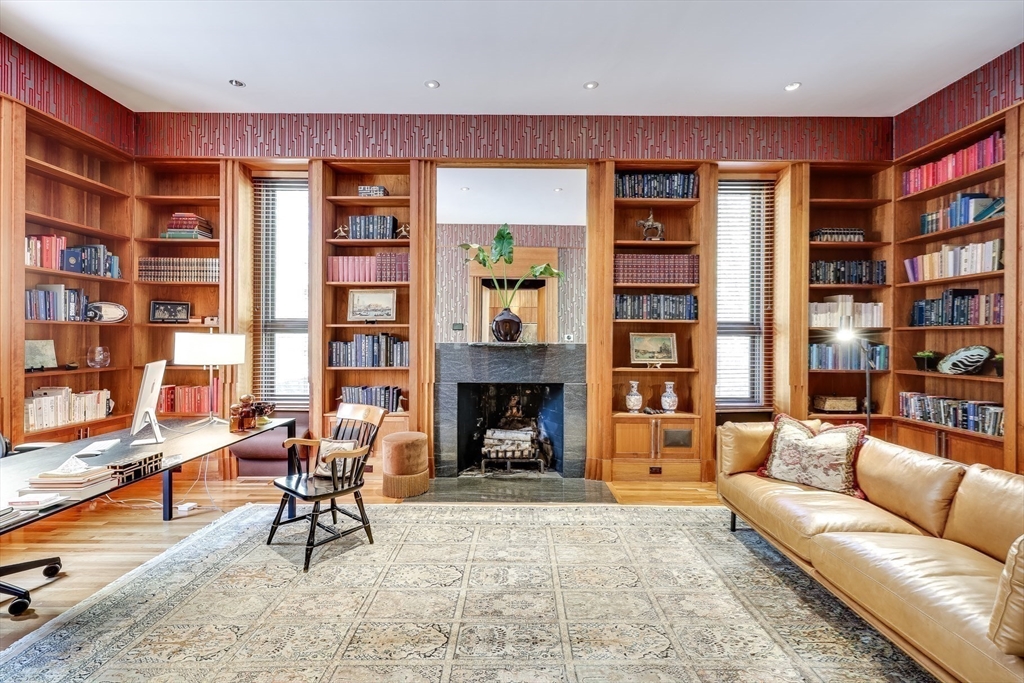 75 Buttricks Hill Drive Concord, MA 01742 - Photo 10 of 24 a living room with furniture and a fireplace