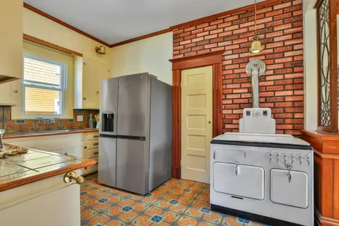 a view of a hallway with windows