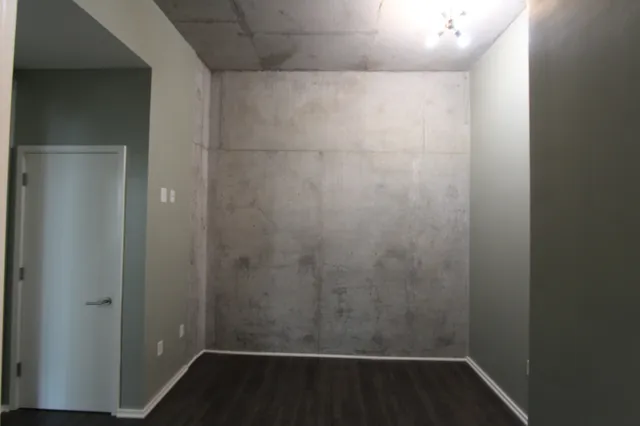 a empty room with wooden floor