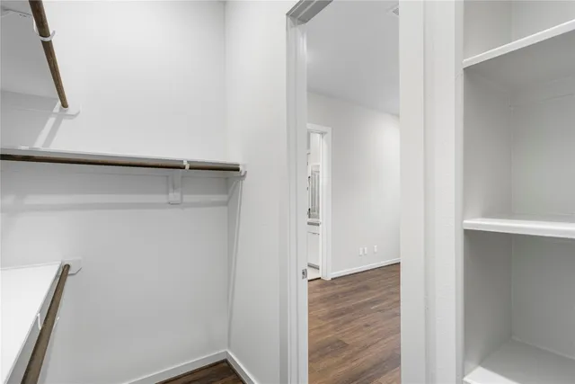 a view of an empty walk in closet