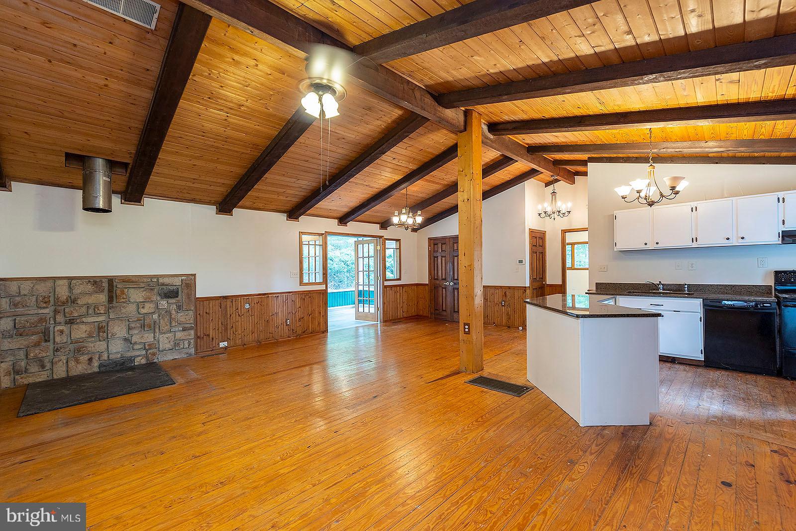 114 Inca Trail Winchester, VA 22602 - Photo 25 of 44 a view of a kitchen with a sink and a microwave