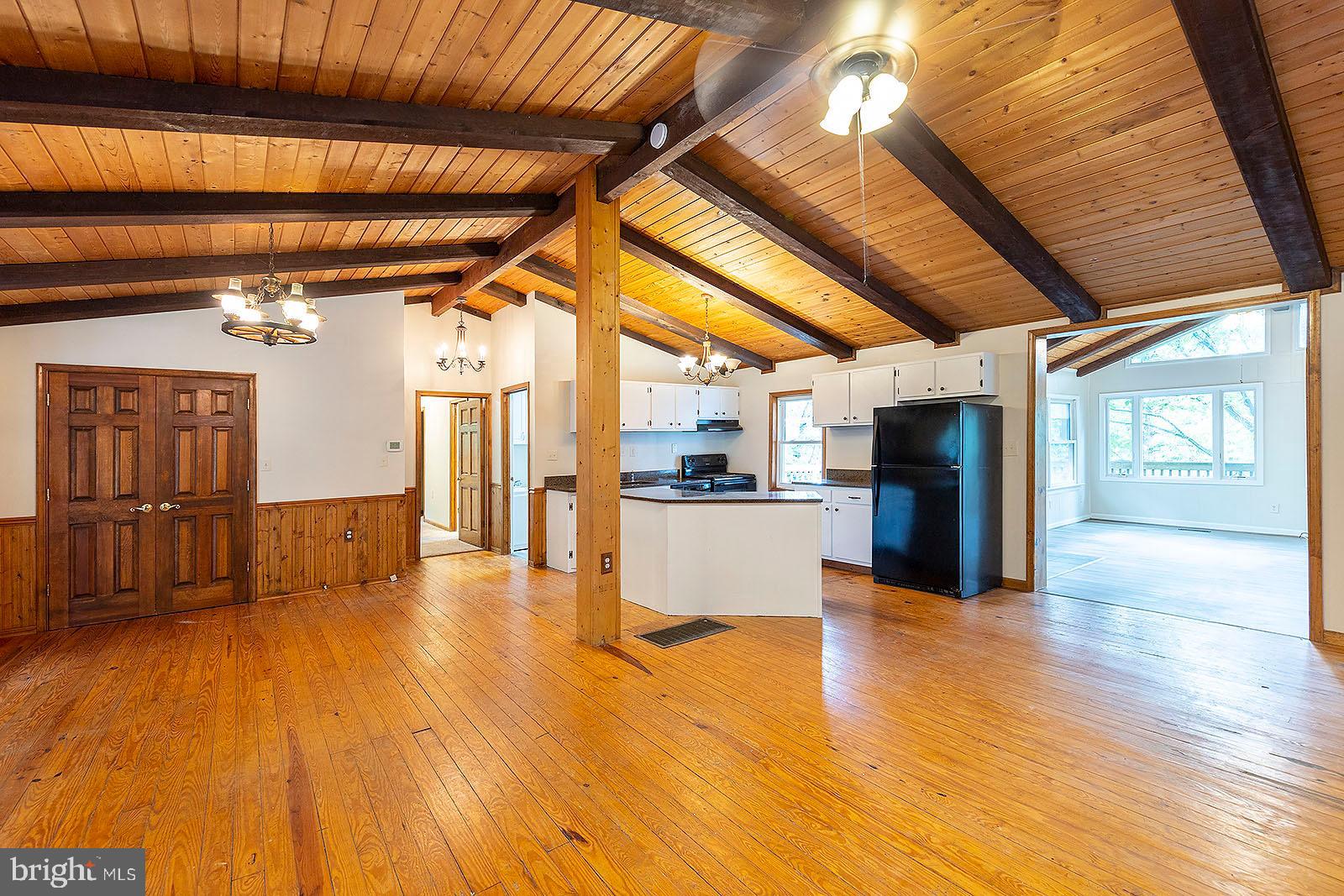 114 Inca Trail Winchester, VA 22602 - Photo 26 of 44 a view of a kitchen with a sink and a microwave
