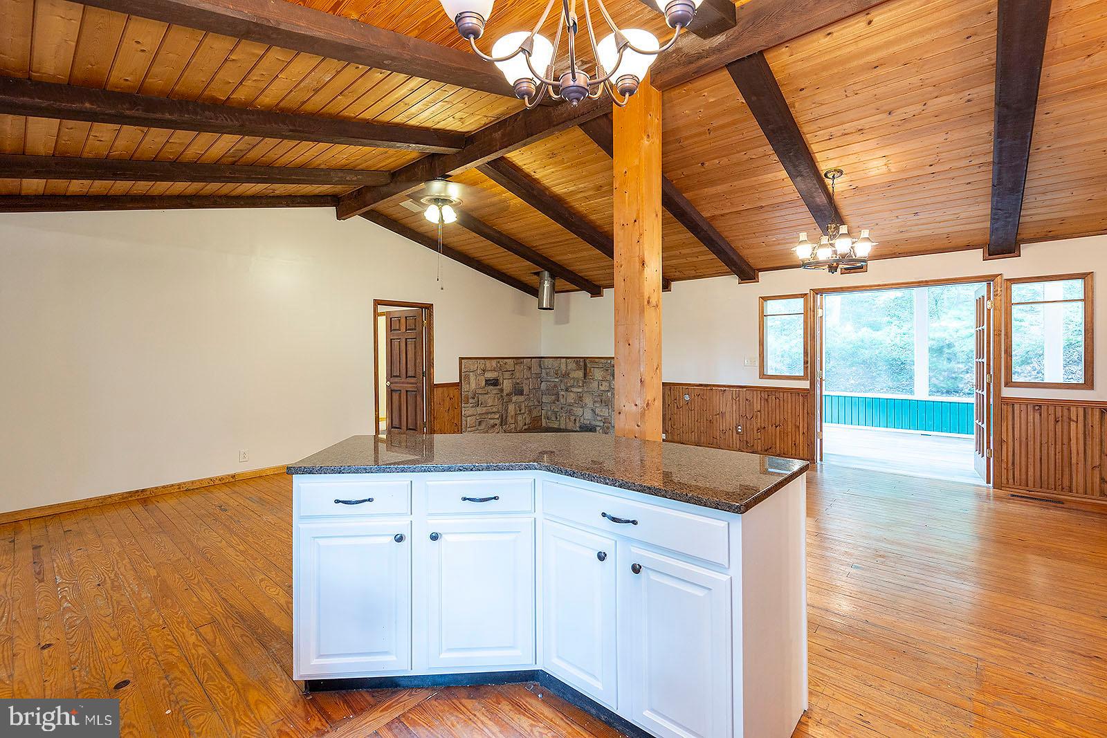 114 Inca Trail Winchester, VA 22602 - Photo 31 of 44 a kitchen with granite countertop a sink and cabinets