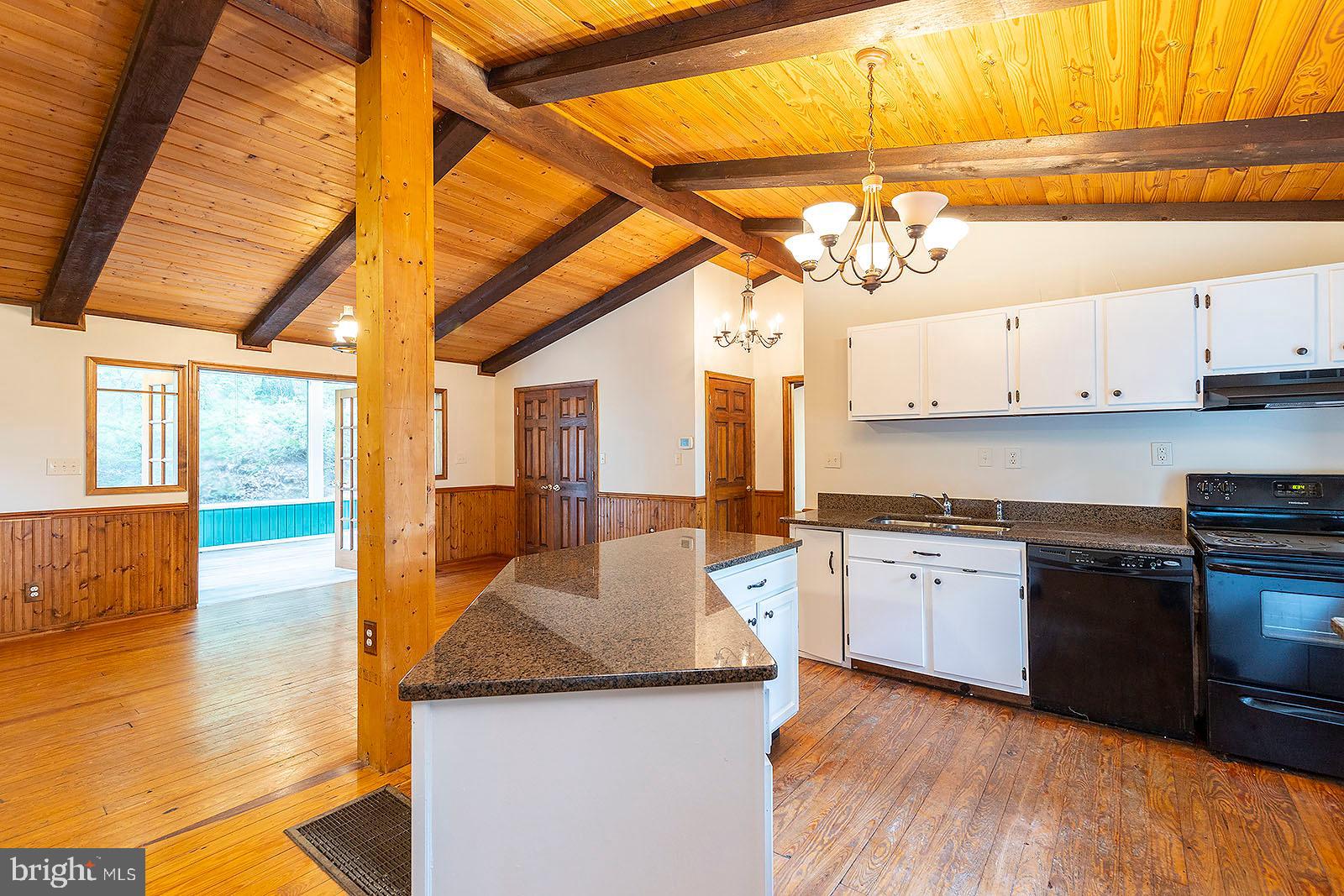 114 Inca Trail Winchester, VA 22602 - Photo 33 of 44 a kitchen with stainless steel appliances granite countertop a sink and cabinets