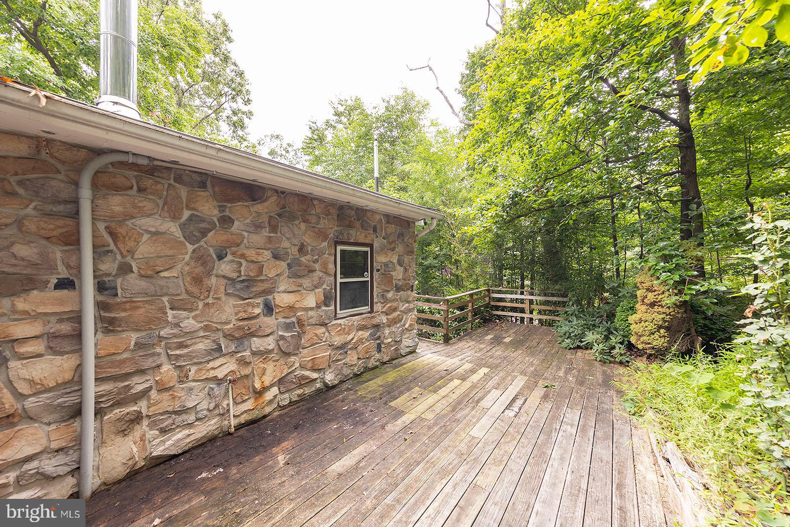 114 Inca Trail Winchester, VA 22602 - Photo 6 of 44 a backyard of a house with wooden floor yard and outdoor seating