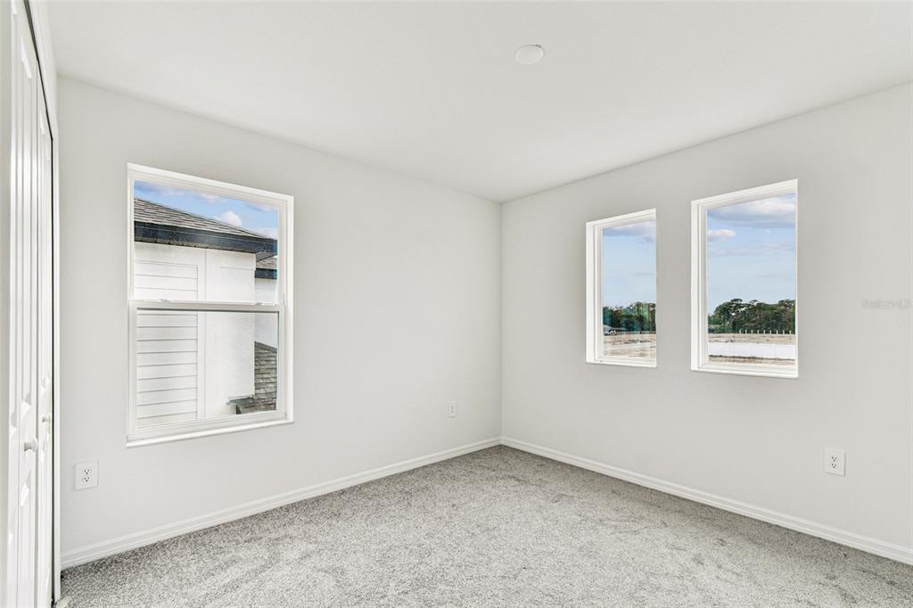 9106 Optimist Way Palmetto, FL 34221 - Photo 18 of 28 a view of an empty room with a window