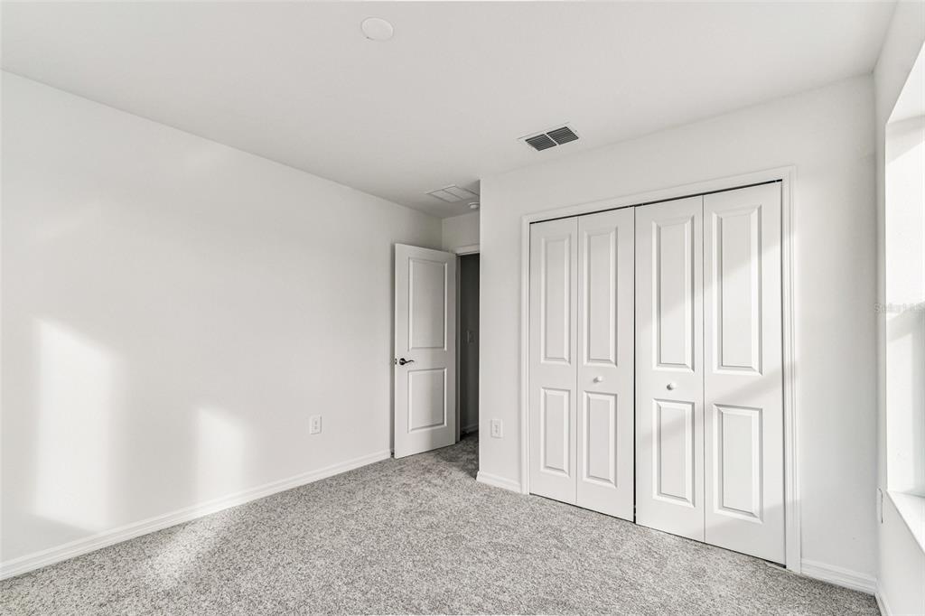 9106 Optimist Way Palmetto, FL 34221 - Photo 19 of 28 a view of an empty room