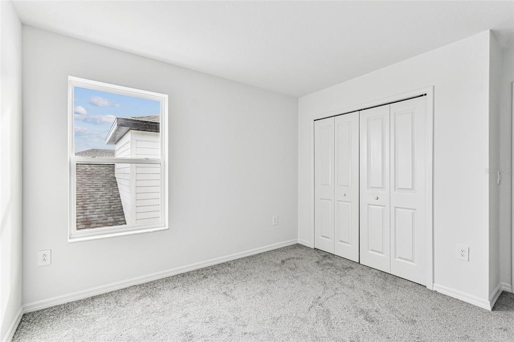 9106 Optimist Way Palmetto, FL 34221 - Photo 24 of 28 an empty room with a window
