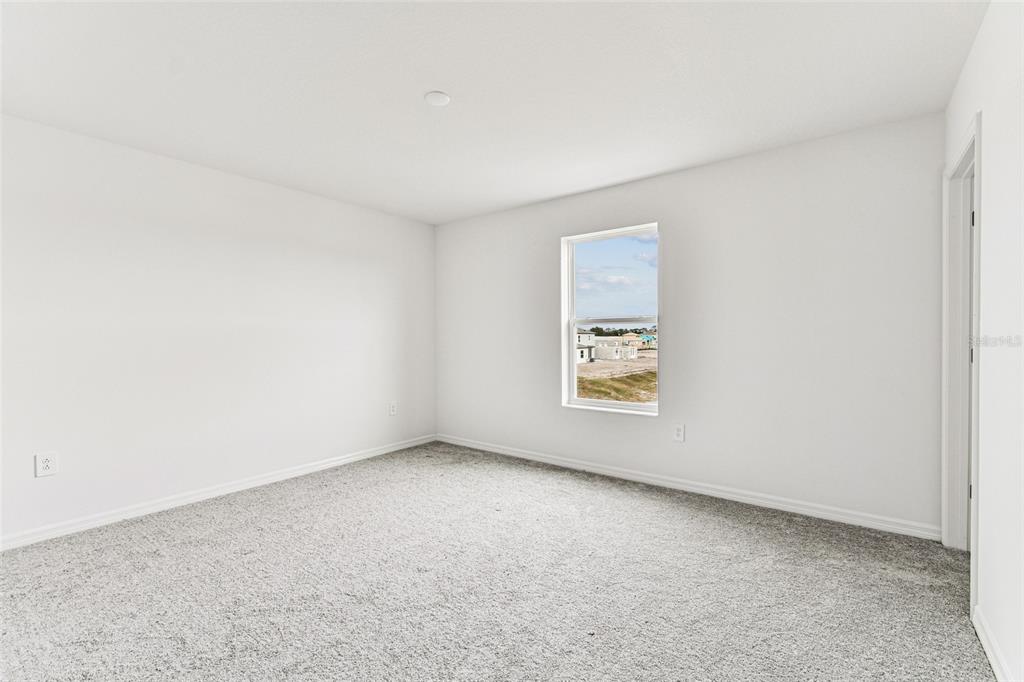 9106 Optimist Way Palmetto, FL 34221 - Photo 26 of 28 an empty room with a window