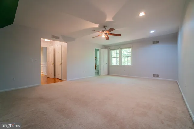 a bathroom with a sink a mirror and a toilet