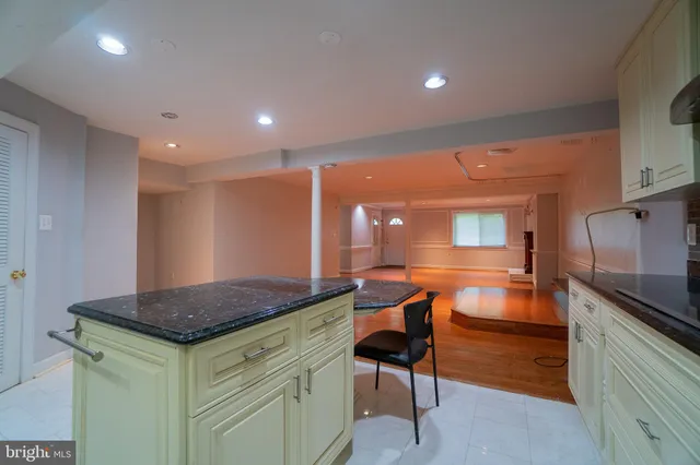 a swimming pool with yard and wooden floor