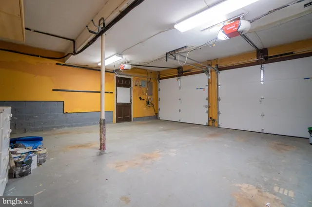 a view of a pathway both side of house