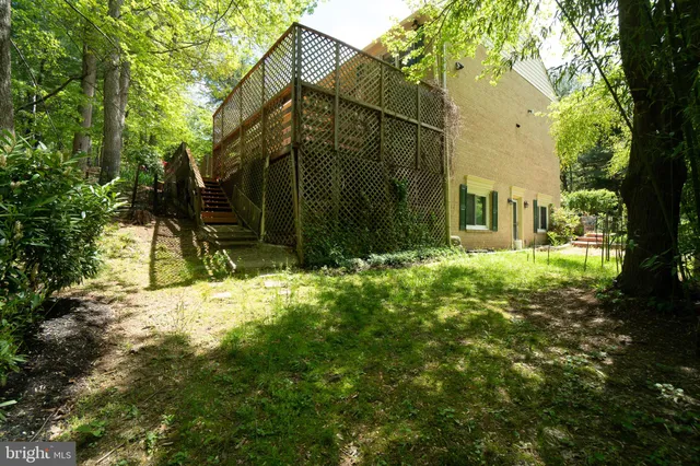 a view of a big room with wooden walls