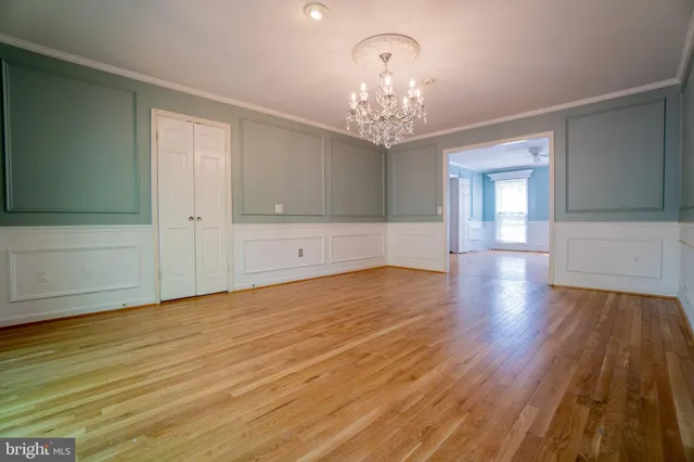 a view of a livingroom with wooden floor