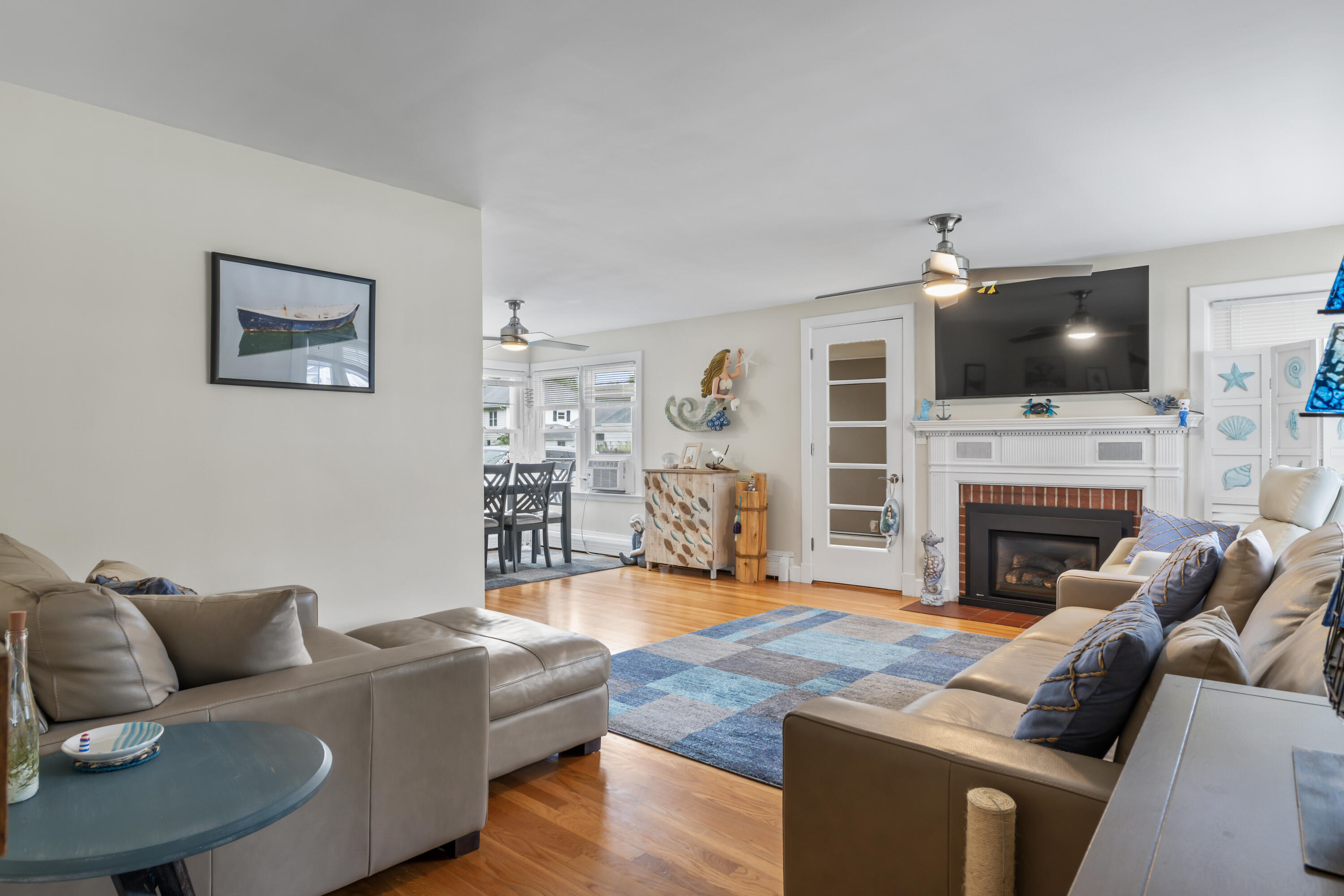 180 Graham Street Biddeford, ME 04005 - Photo 29 of 61 Fireplace in center of eating/lounging