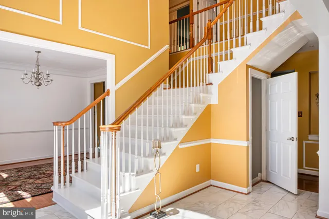 a kitchen with lots of counter top space and stainless steel appliances