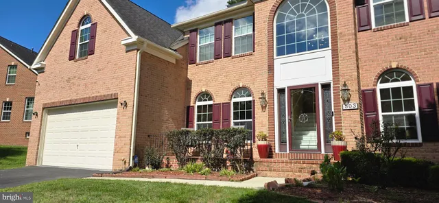 a view of a backyard of the house
