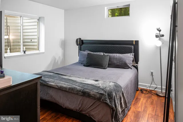 a sign that is sitting in front of a house