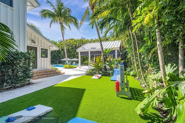 a view of outdoor space yard deck patio and outdoor kitchen