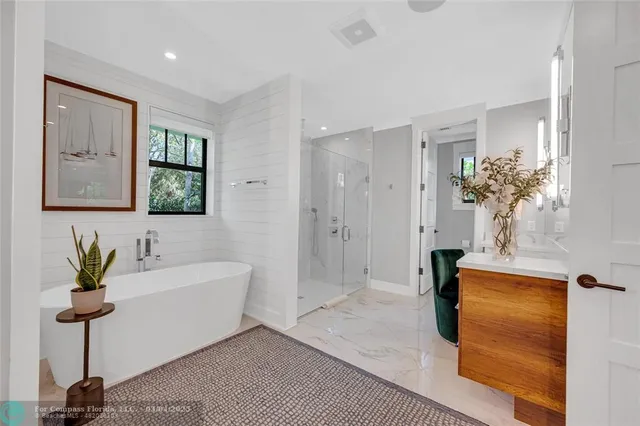 a view of hallway with wooden floor and front door