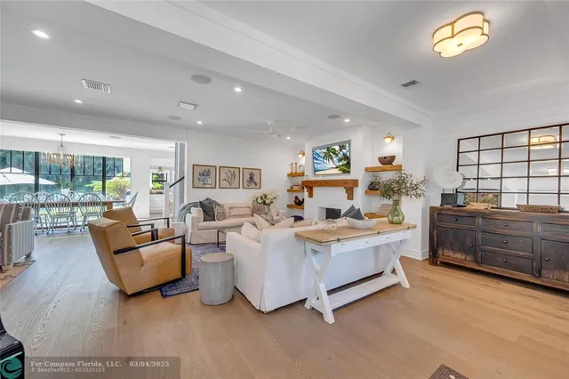 a view of a livingroom with furniture and window