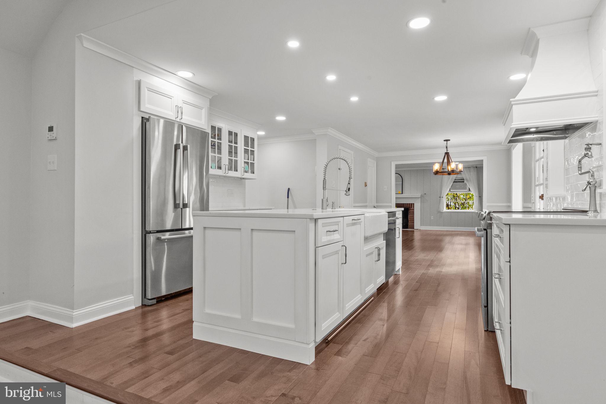 1434 Holcomb Road Huntingdon Valley, PA 19006 - Photo 15 of 49 a kitchen with refrigerator and cabinets