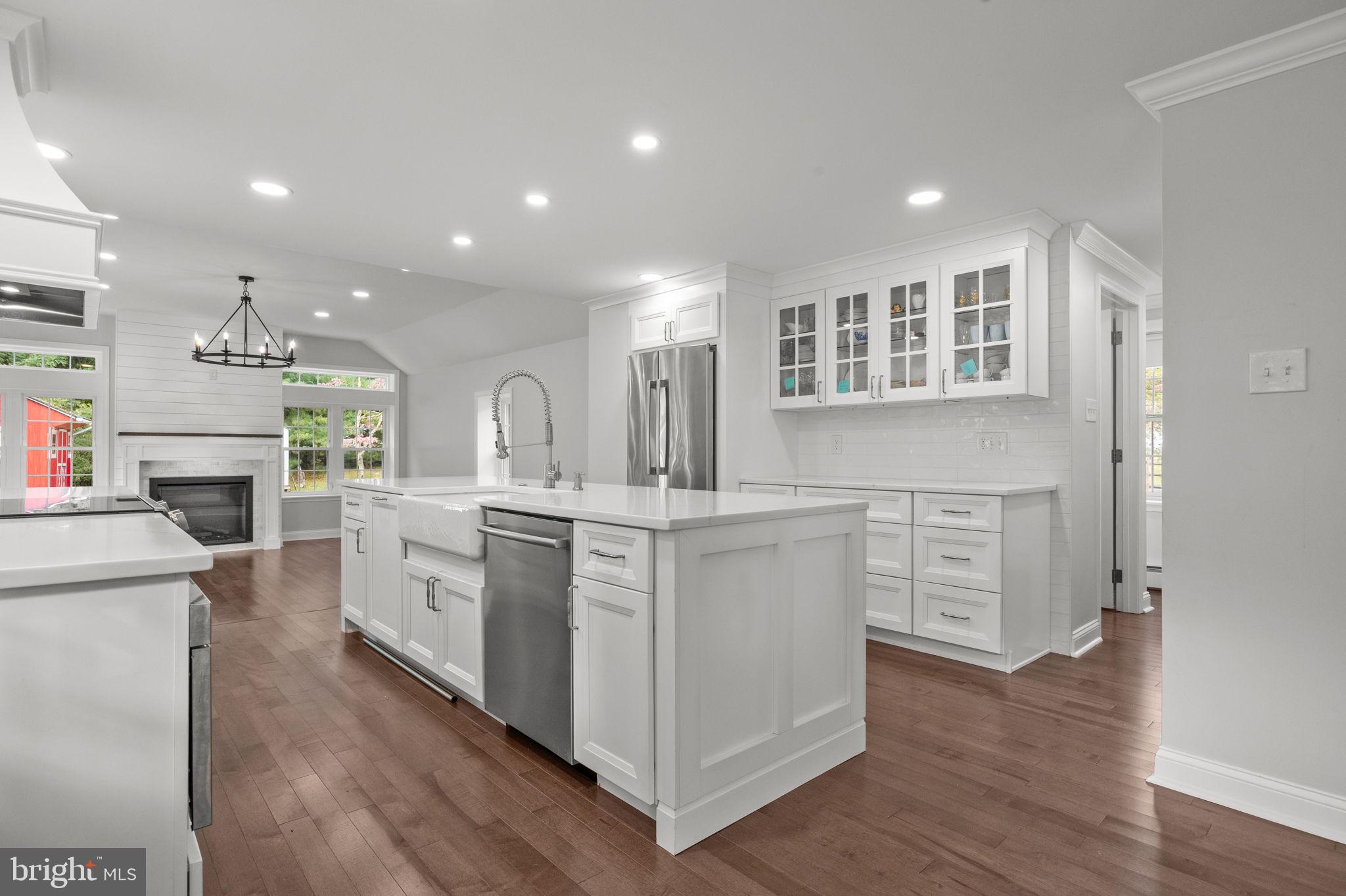 1434 Holcomb Road Huntingdon Valley, PA 19006 - Photo 17 of 49 a kitchen with white cabinets and sink