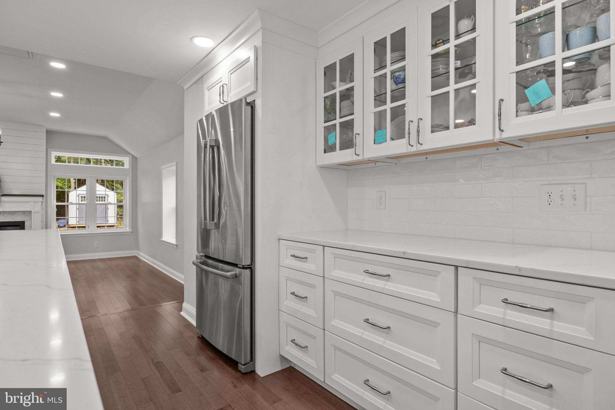1434 Holcomb Road Huntingdon Valley, PA 19006 - Photo 19 of 49 a view of kitchen with wooden floor and electronic appliances