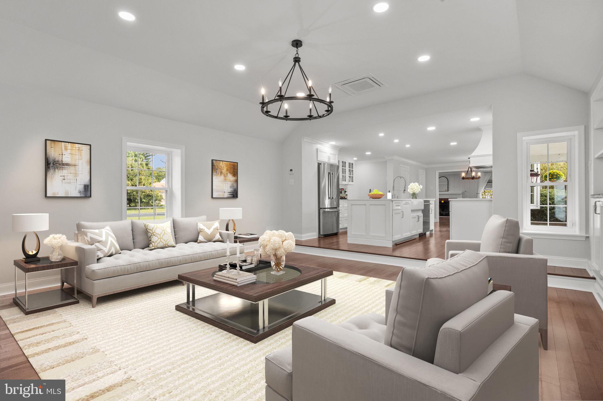 1434 Holcomb Road Huntingdon Valley, PA 19006 - Photo 20 of 49 a living room with furniture kitchen and a chandelier