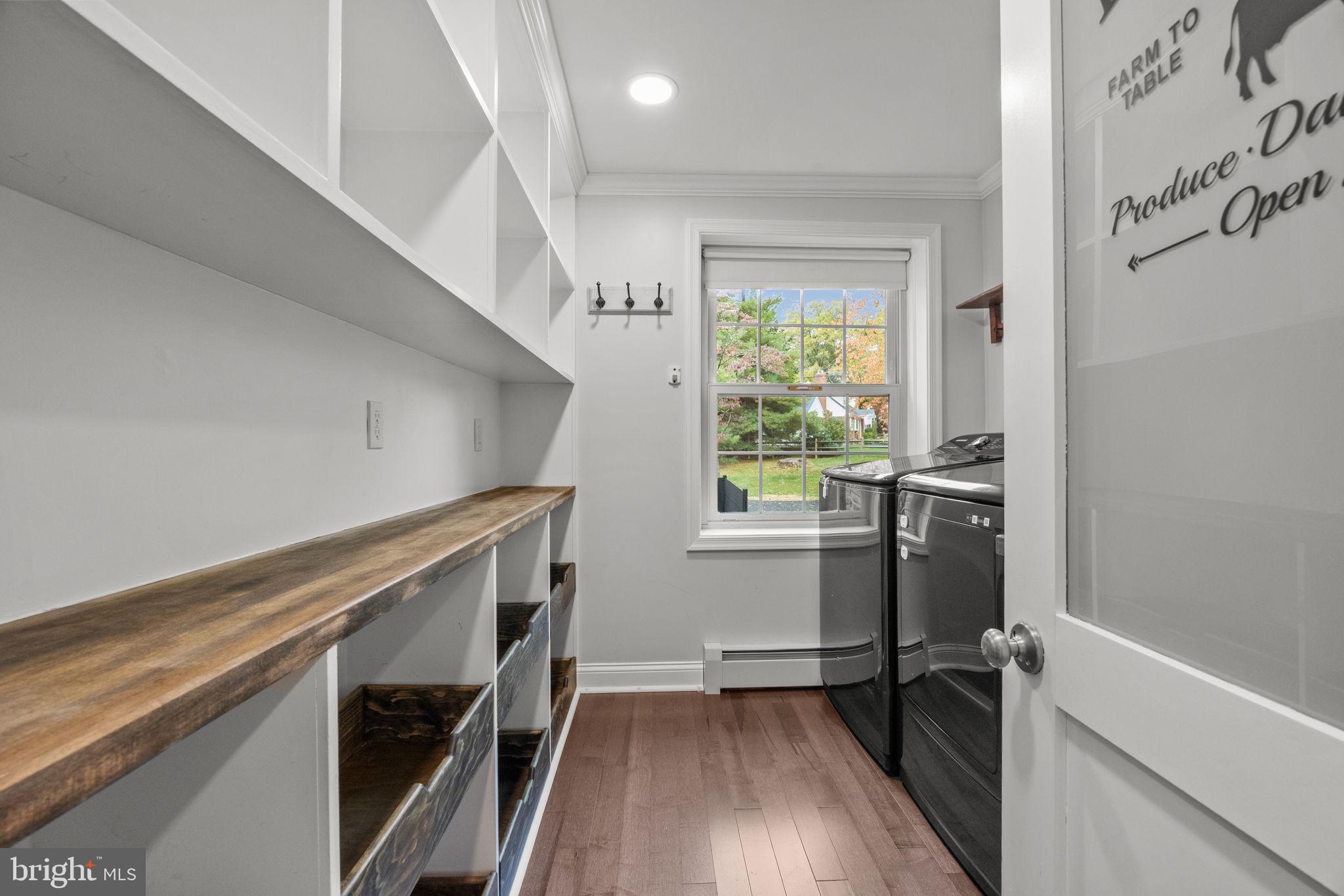1434 Holcomb Road Huntingdon Valley, PA 19006 - Photo 25 of 49 a view of hallway with window and wooden floor