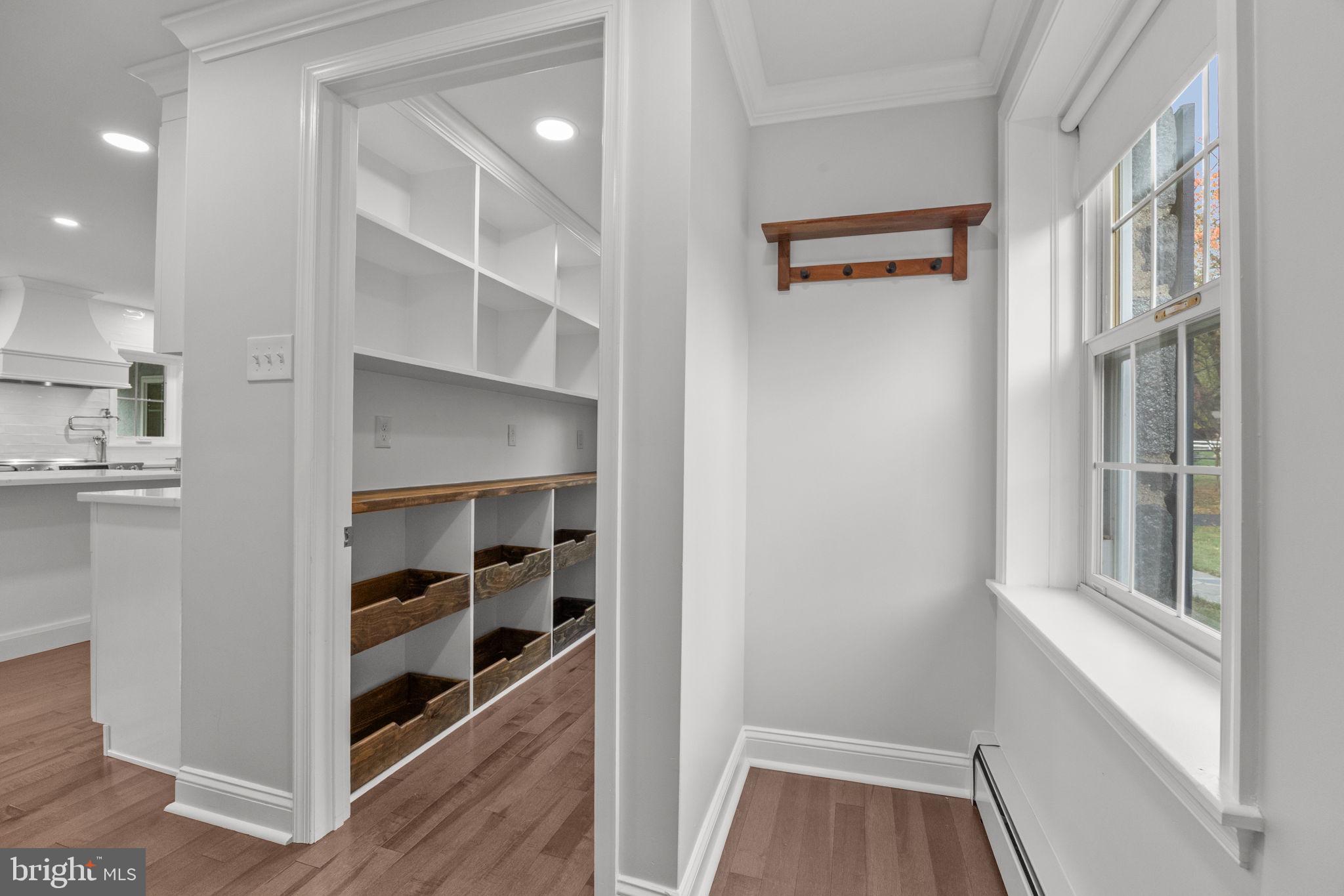 1434 Holcomb Road Huntingdon Valley, PA 19006 - Photo 27 of 49 a view of walk in closet with empty racks