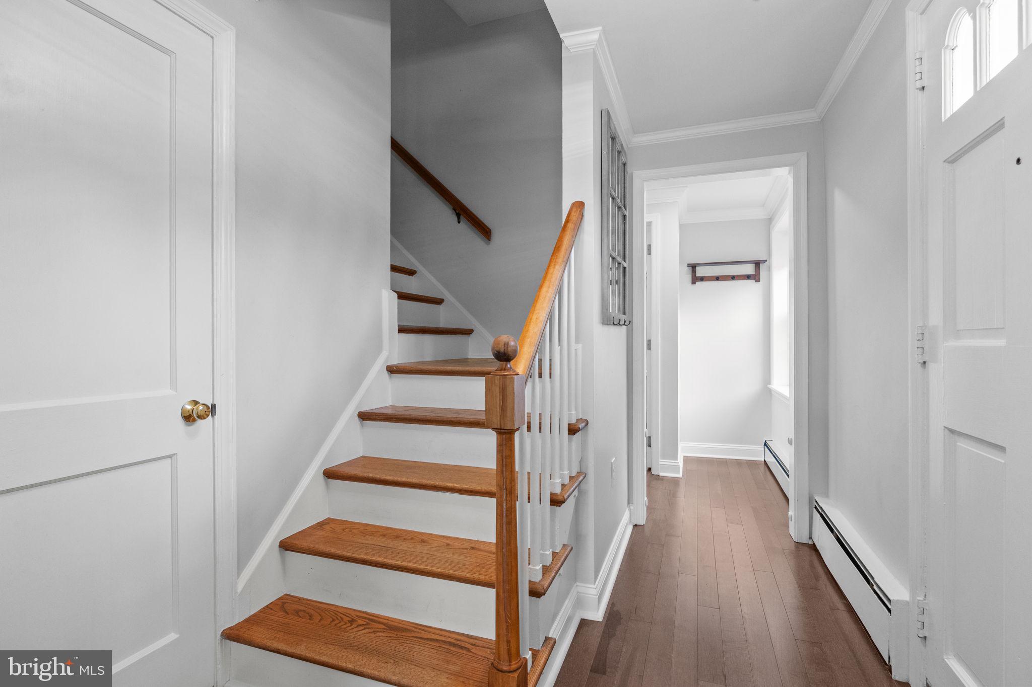 1434 Holcomb Road Huntingdon Valley, PA 19006 - Photo 28 of 49 a view of a hallway with wooden floor and entryway