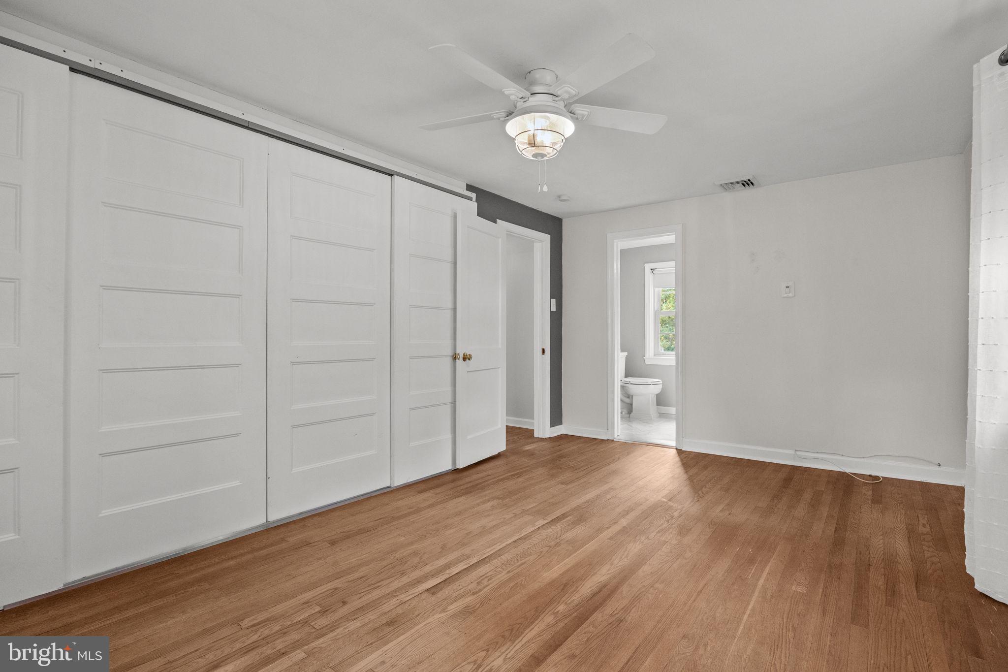 1434 Holcomb Road Huntingdon Valley, PA 19006 - Photo 31 of 49 a view of an empty room with wooden floor