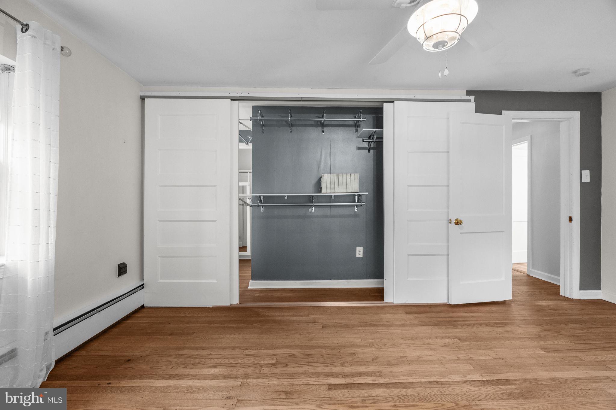 1434 Holcomb Road Huntingdon Valley, PA 19006 - Photo 33 of 49 a view of an empty room with wooden floor