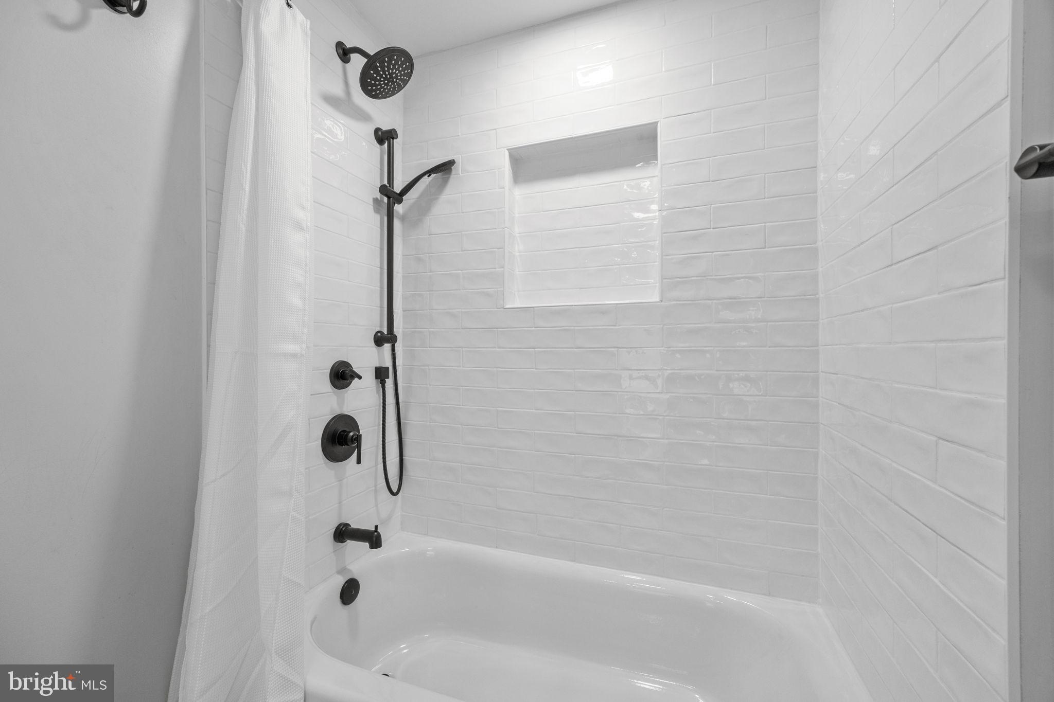 1434 Holcomb Road Huntingdon Valley, PA 19006 - Photo 39 of 49 a bathroom with a bathtub